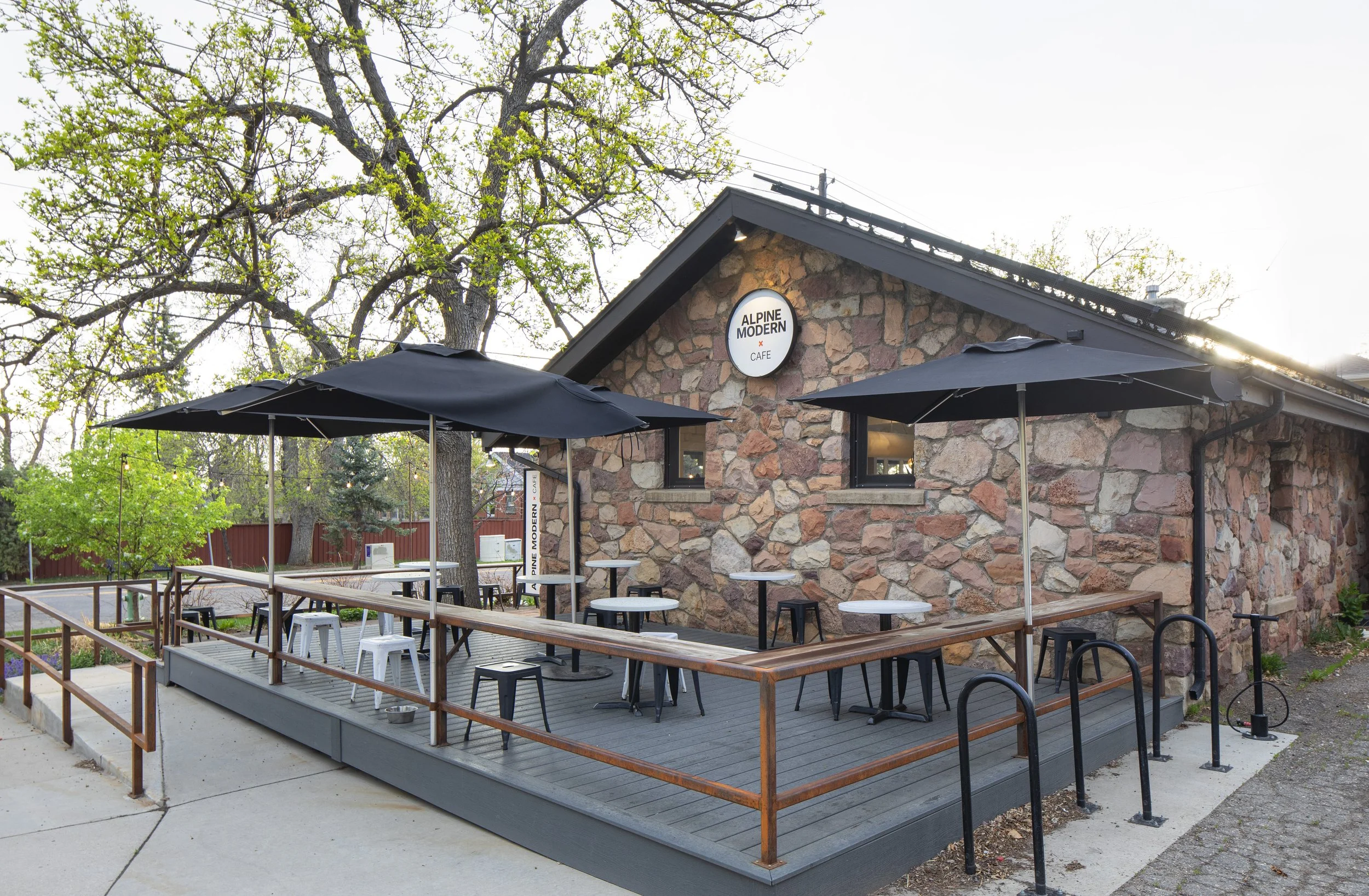 Alpine Modern University Hill porch — a charming outdoor seating area in Boulder